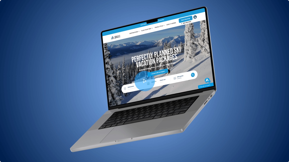 The Ski.com website on a laptop